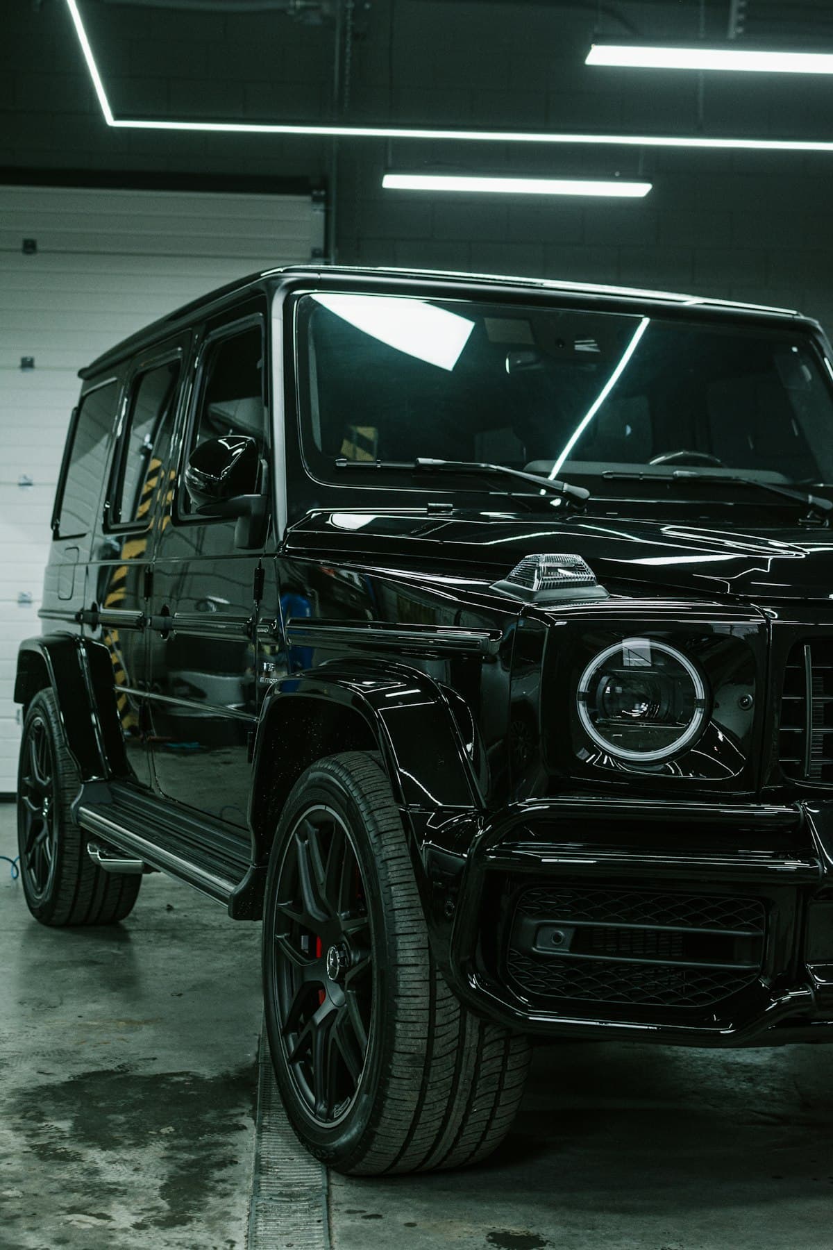 Black Mercedes sedan with showroom-quality finish