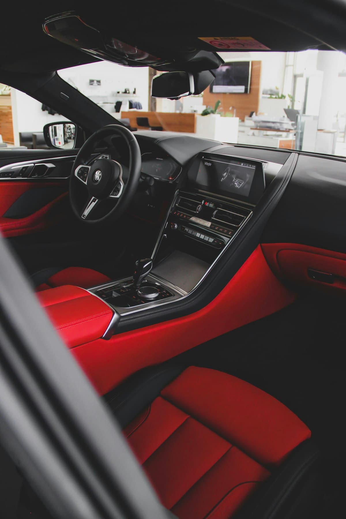Luxury car interior with red and black leather