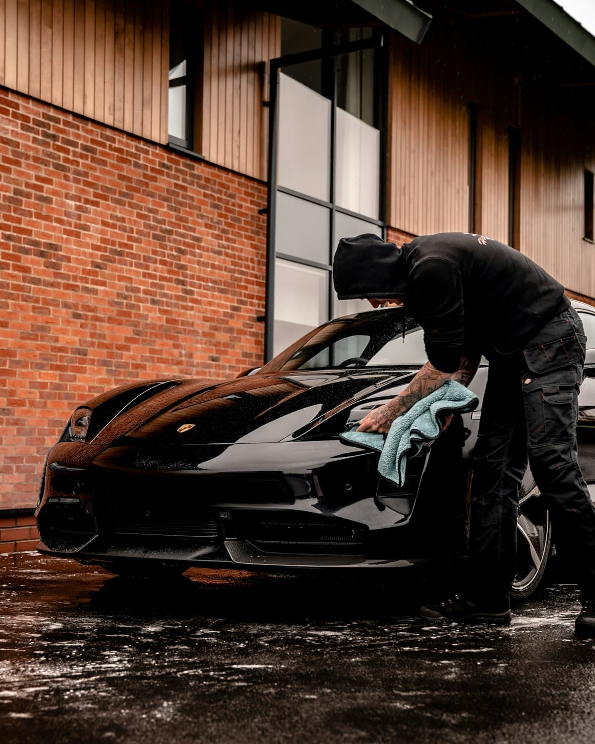 Professional detailer working on BMW
